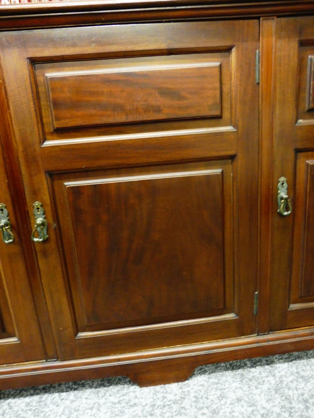 MAHOGANY BOOKCASE ON CUPBOARD  View XI