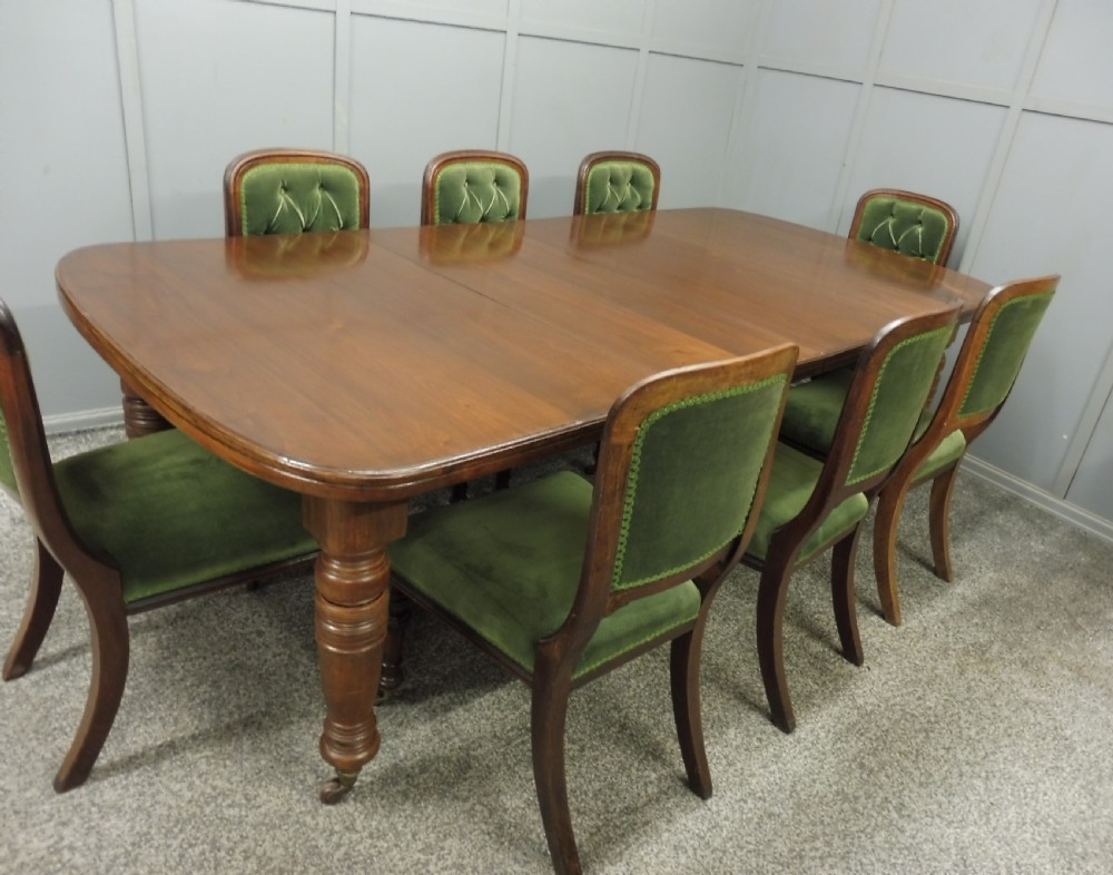 VICTORIAN WALNUT EXTENDING DINING TABLE AND 8 CHAIRS