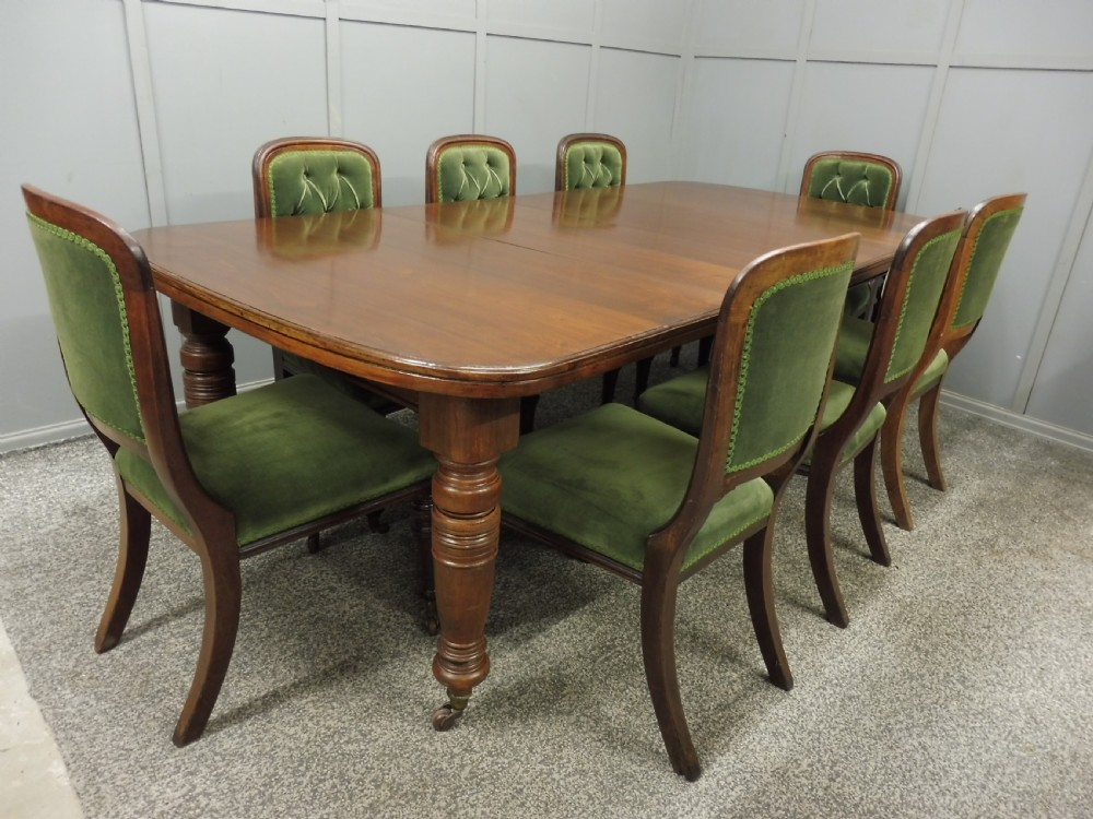 VICTORIAN WALNUT EXTENDING DINING TABLE AND 8 CHAIRS View II