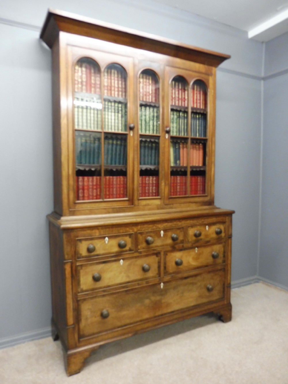 EARLY 19TH CENTURY BOOKCASE ON CHEST View II
