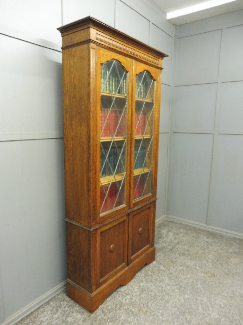 OAK BOOKCASE WITH LEADED GLASS DOORS View II