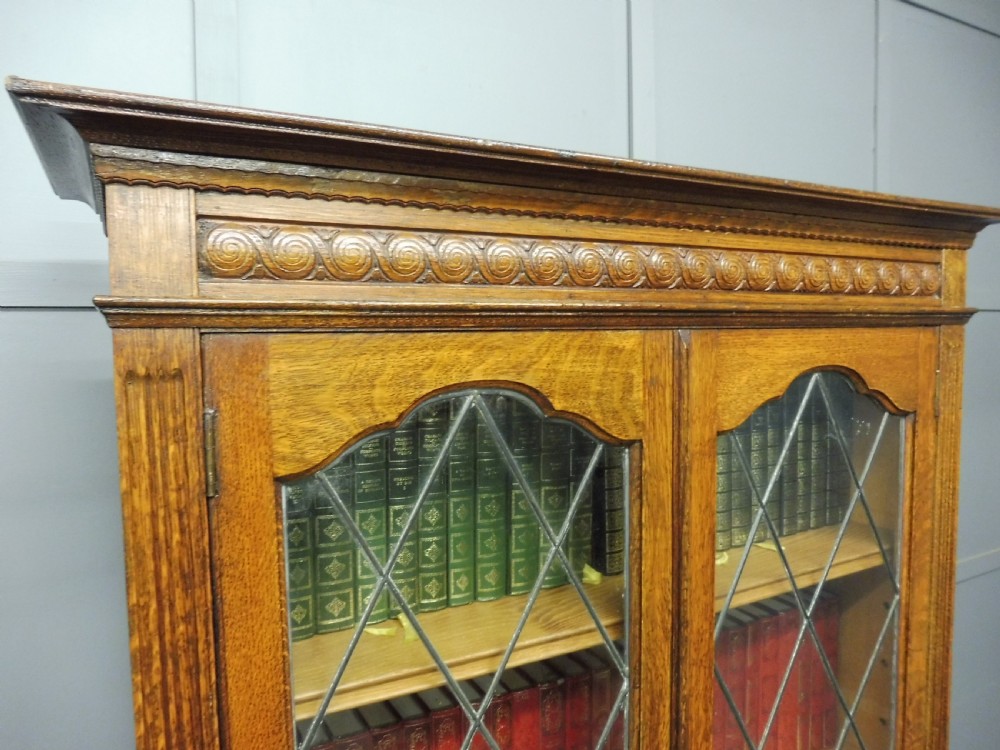OAK BOOKCASE WITH LEADED GLASS DOORS View VI
