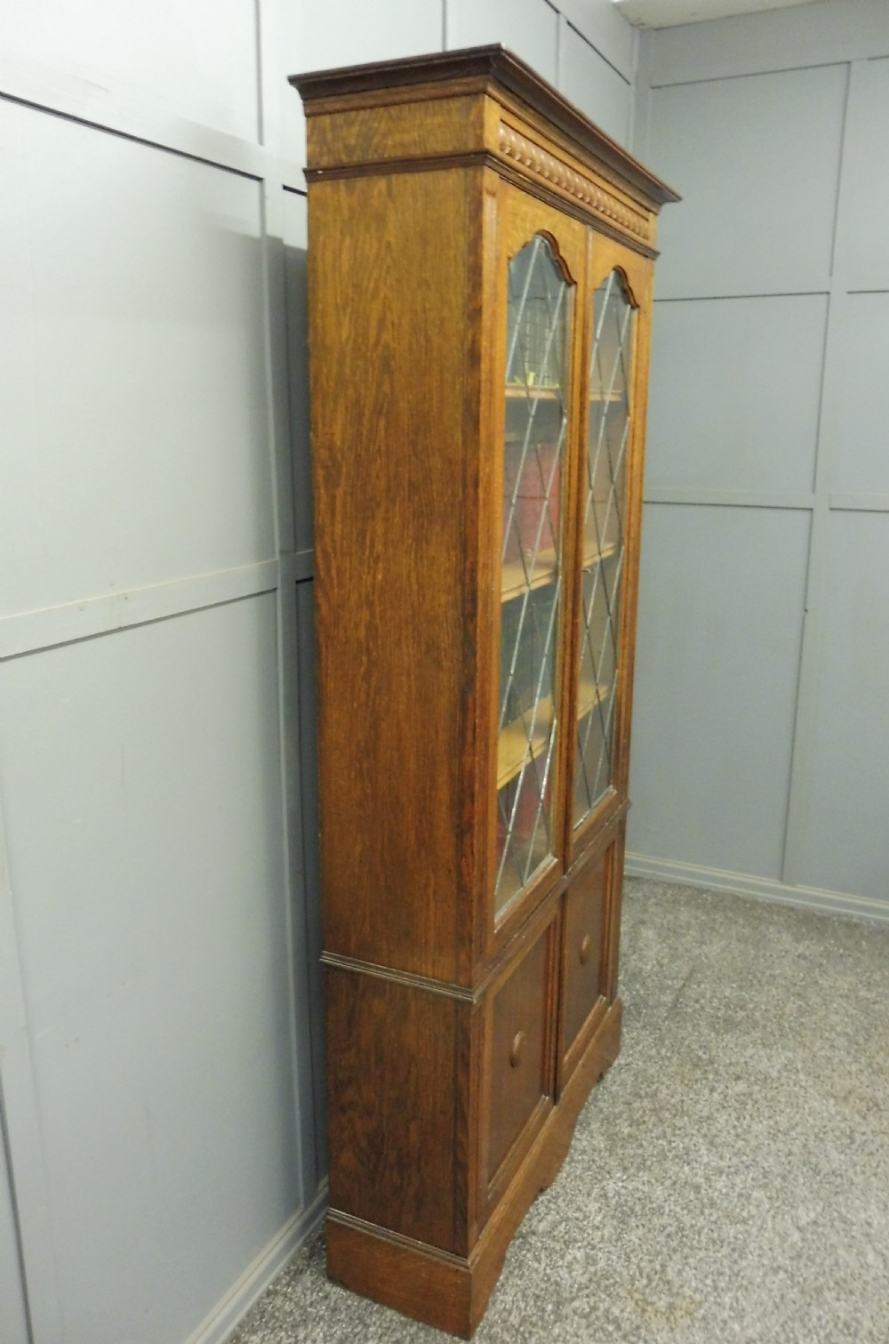 OAK BOOKCASE WITH LEADED GLASS DOORS View VII