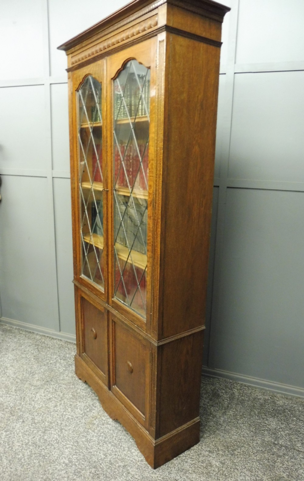 OAK BOOKCASE WITH LEADED GLASS DOORS View VIII