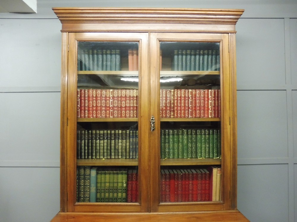 VICTORIAN WALNUT BOOKCASE BY MAPLE AND CO View VI