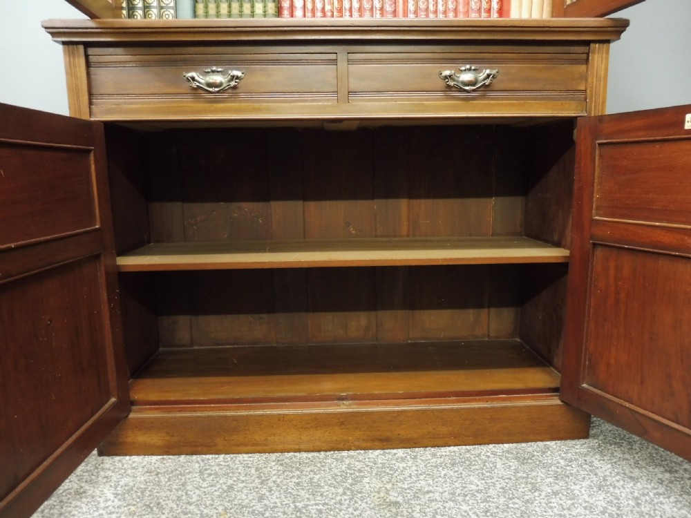 VICTORIAN WALNUT BOOKCASE BY MAPLE AND CO View IX