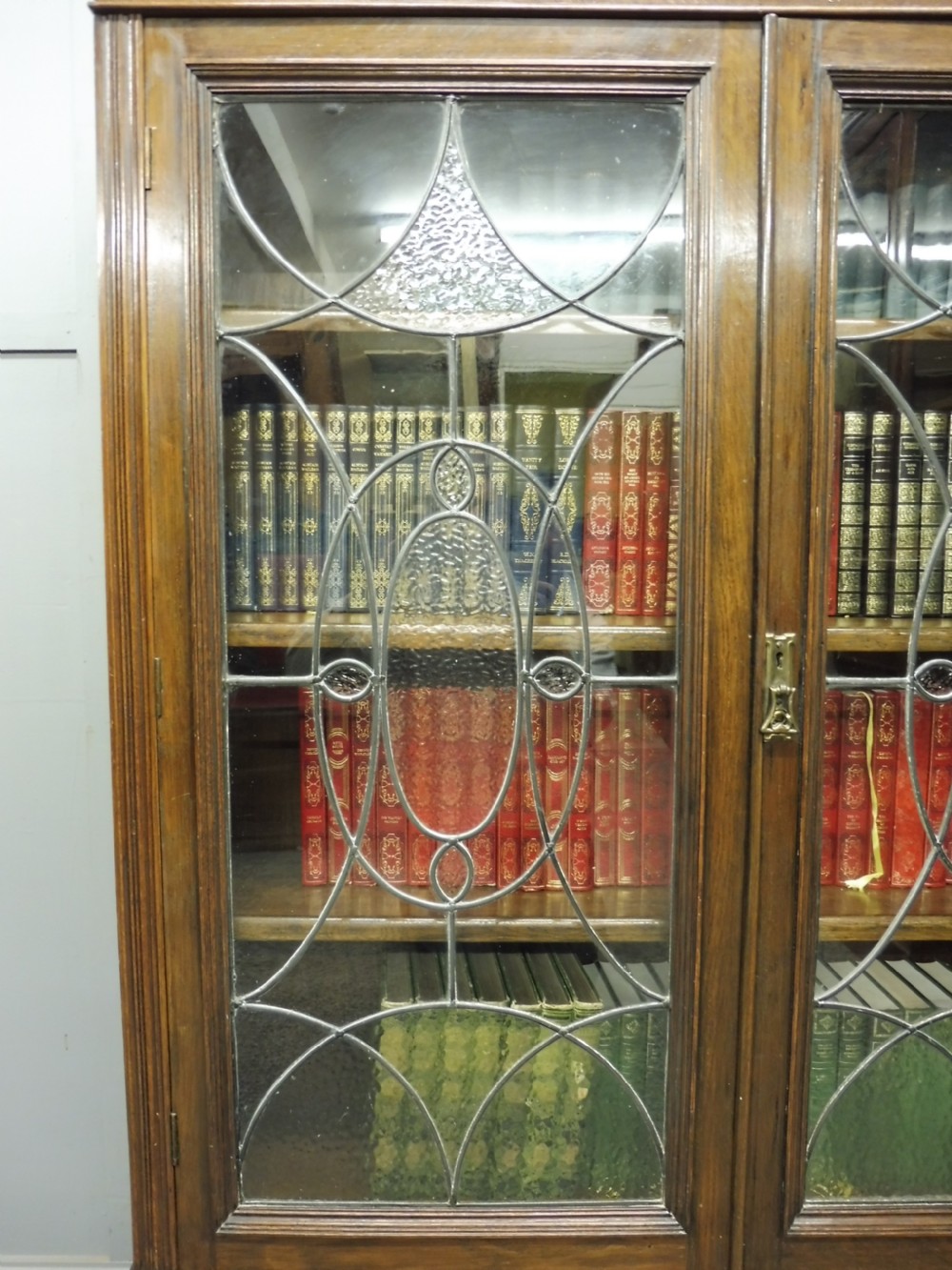 OAK BOOKCASE WITH ART DECO GLASS DOORS CIRCA 1920 View III