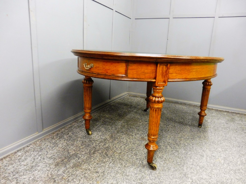 MID 19TH CENTURY OVAL OAK LIBRARY WRITING TABLE View IV