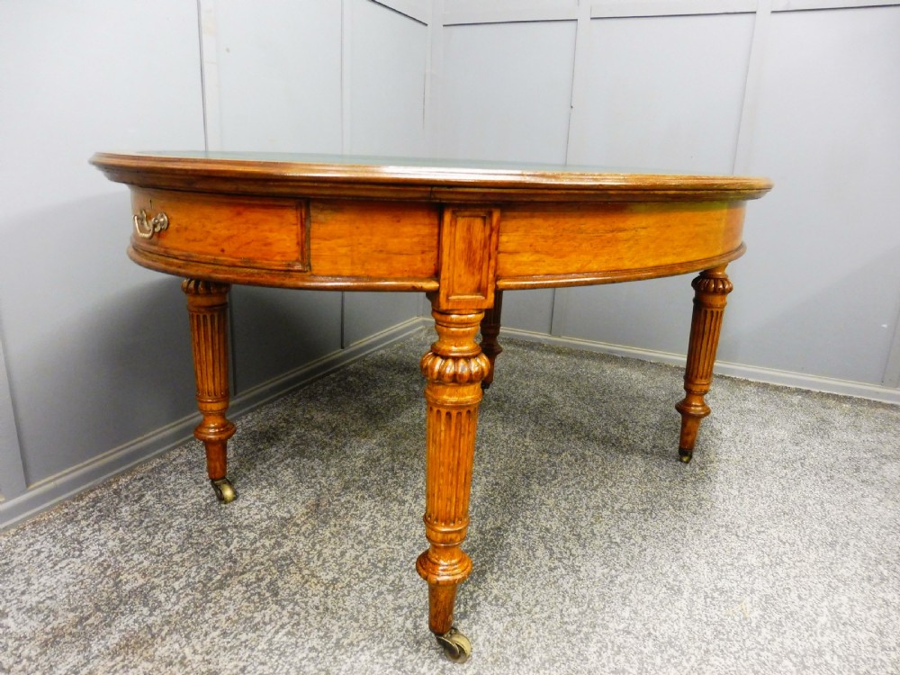 MID 19TH CENTURY OVAL OAK LIBRARY WRITING TABLE View V