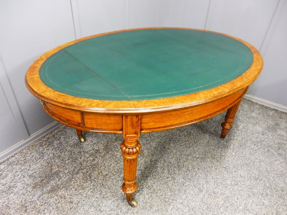 MID 19TH CENTURY OVAL OAK LIBRARY WRITING TABLE View VI