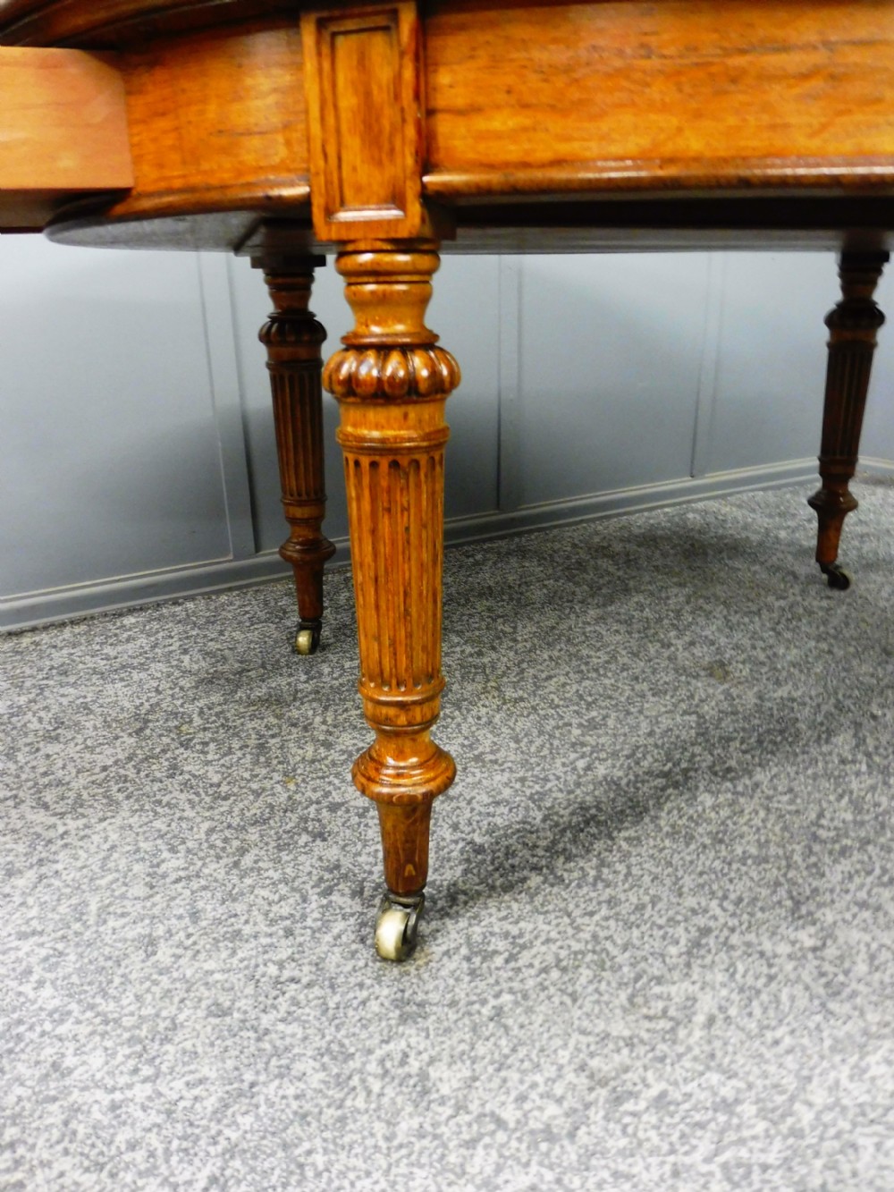 MID 19TH CENTURY OVAL OAK LIBRARY WRITING TABLE View XI