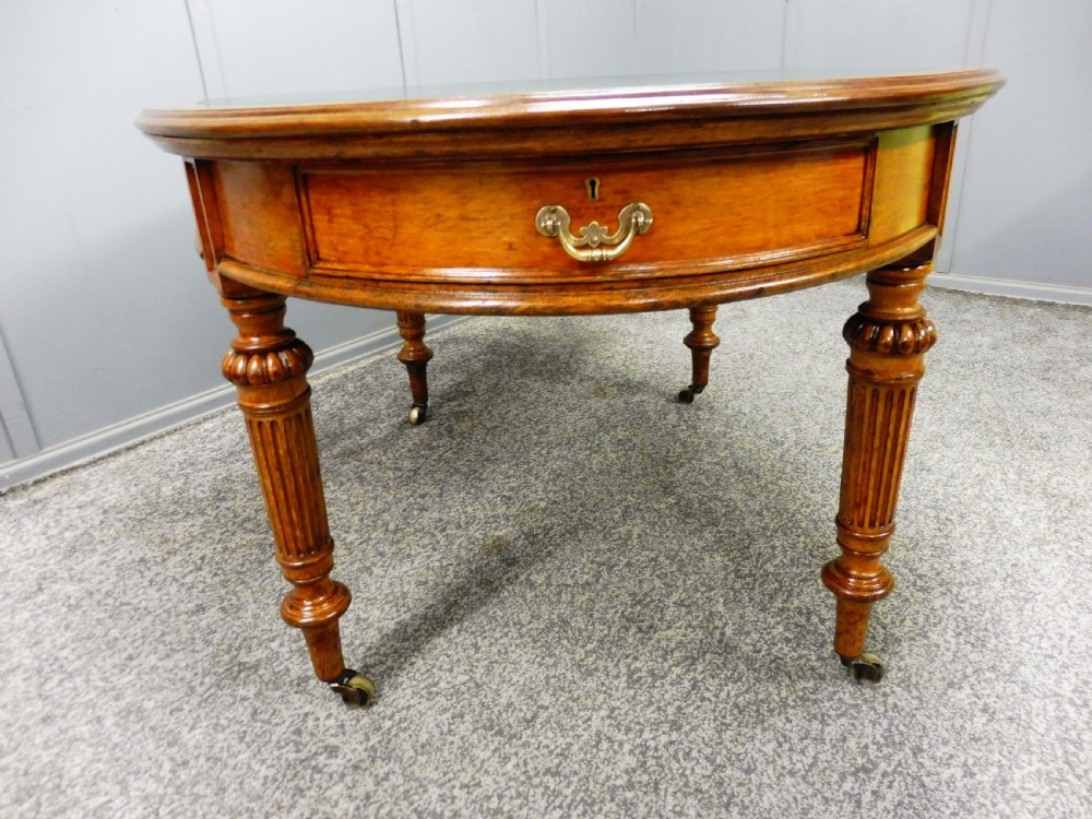 MID 19TH CENTURY OVAL OAK LIBRARY WRITING TABLE View XII