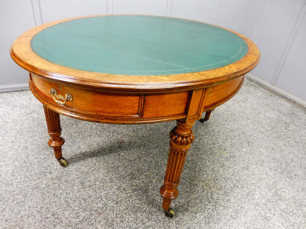 MID 19TH CENTURY OVAL OAK LIBRARY WRITING TABLE View XV