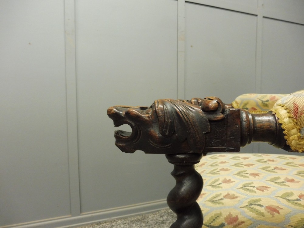 CARVED OAK 19TH CENTURY ARMCHAIR WITH DOGS HEAD ARMS View IX