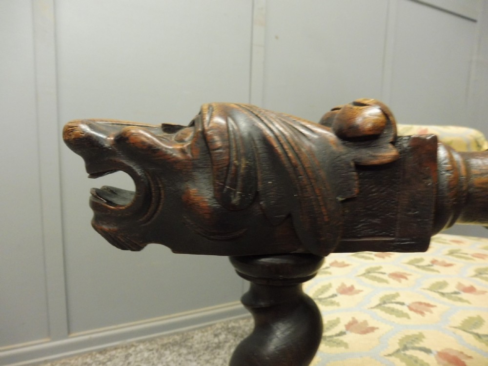 CARVED OAK 19TH CENTURY ARMCHAIR WITH DOGS HEAD ARMS View X