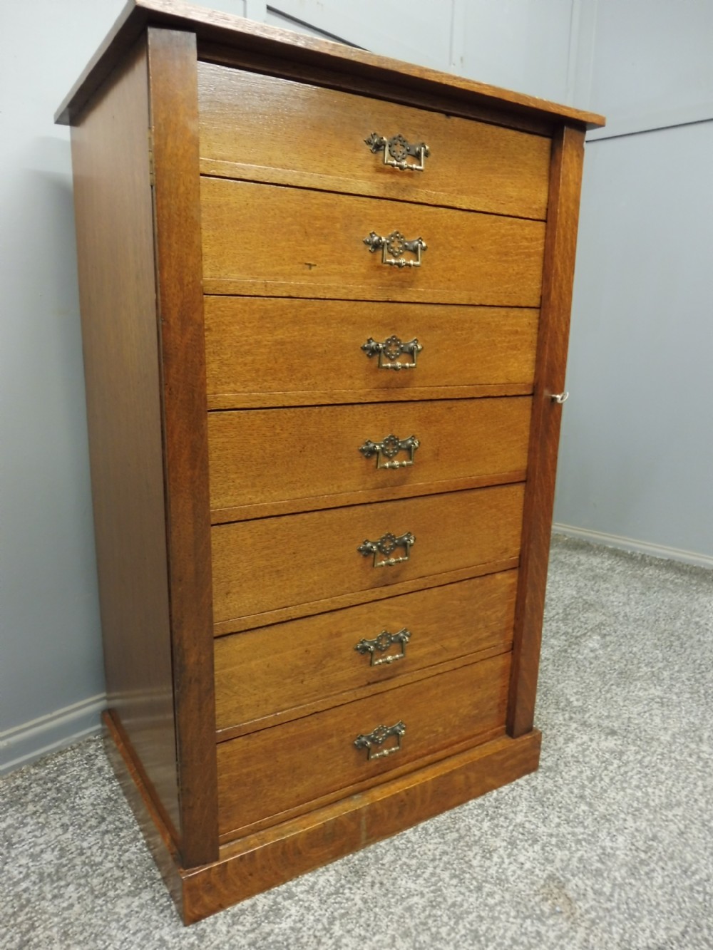 EDWARDIAN OAK WELLINGTON COLLECTORS CHEST View III