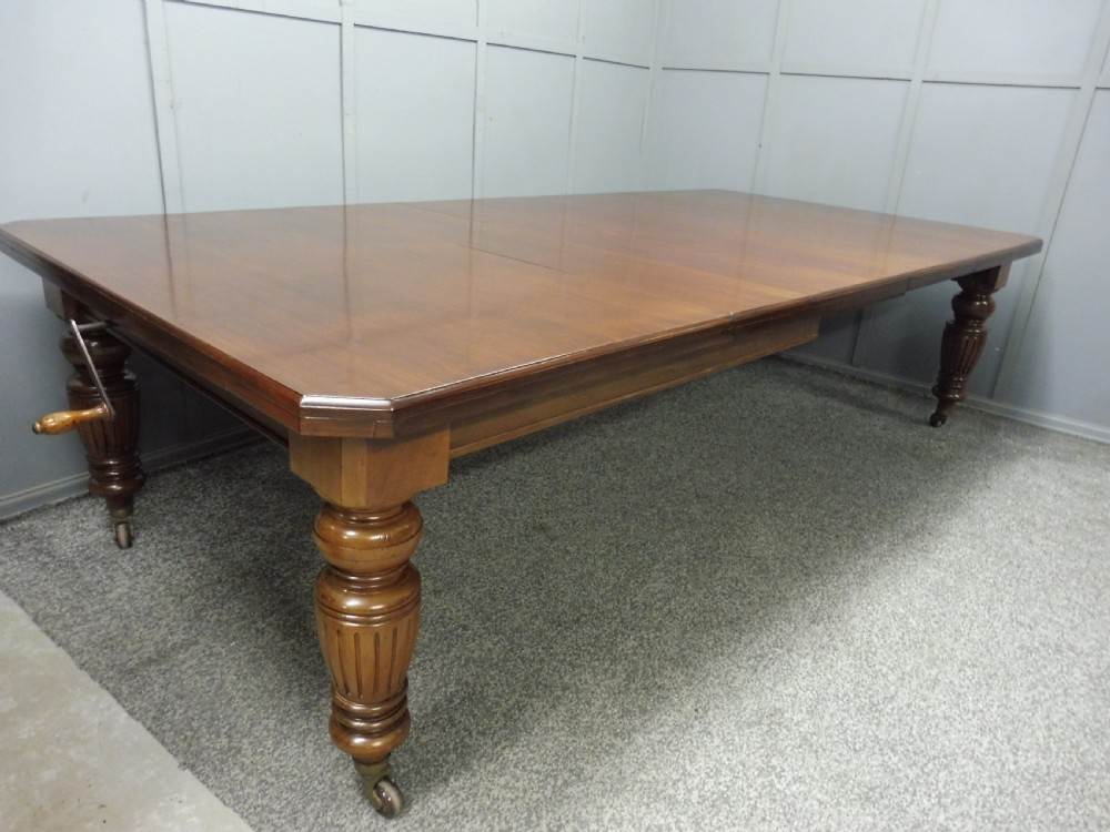 LARGE VICTORIAN MAHOGANY EXTENDING DINING TABLE View III