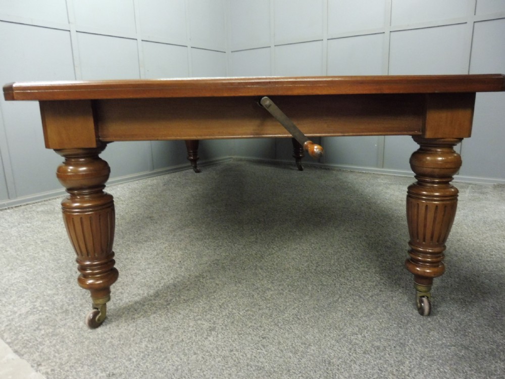 LARGE VICTORIAN MAHOGANY EXTENDING DINING TABLE View VI