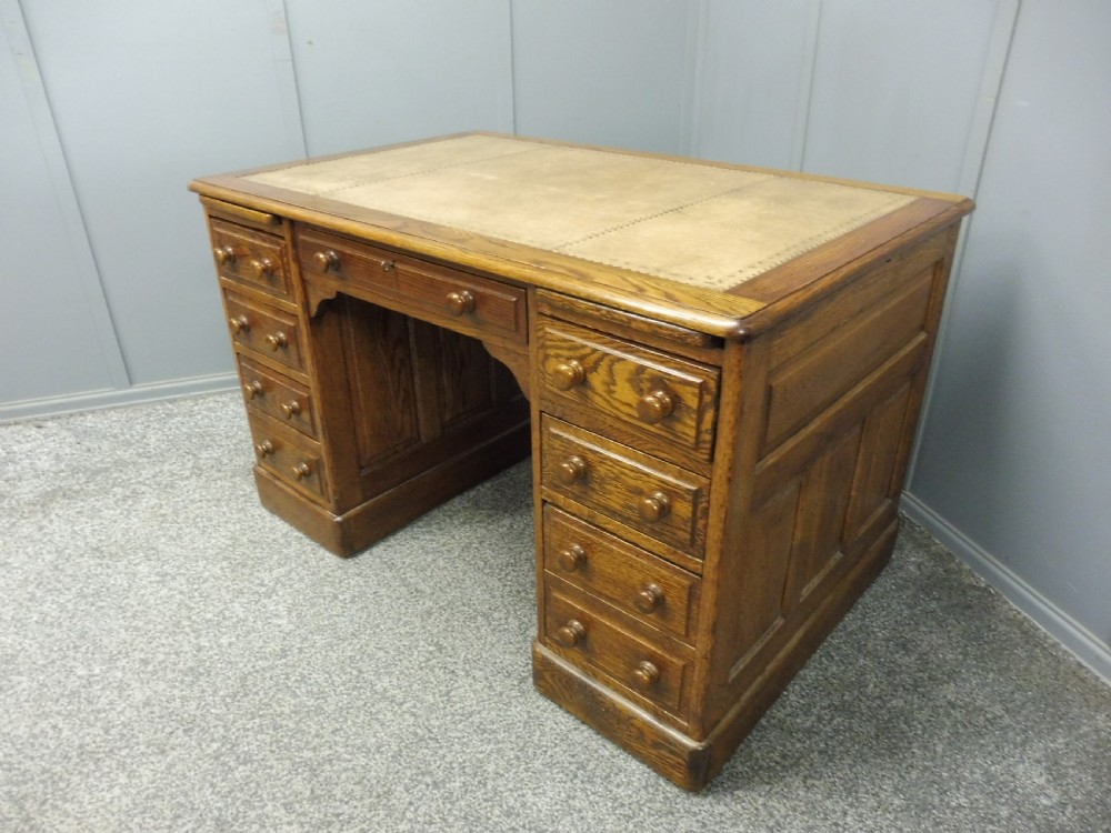 OAK LEATHER TOPPED DESK