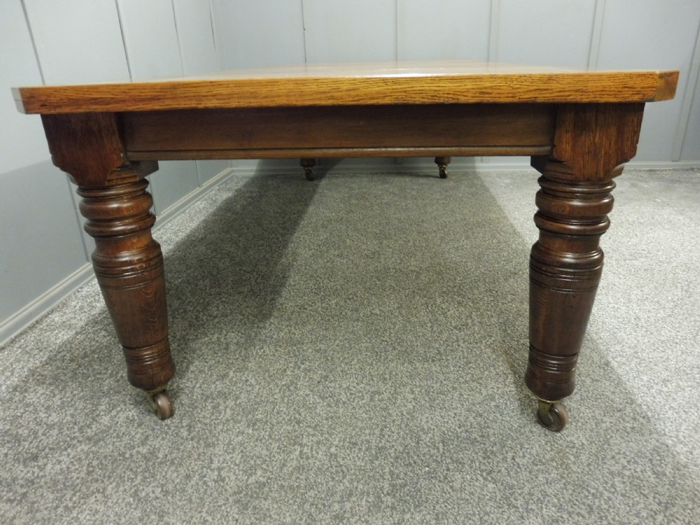 LARGE OAK VICTORIAN EXTENDING DINING TABLE View IV