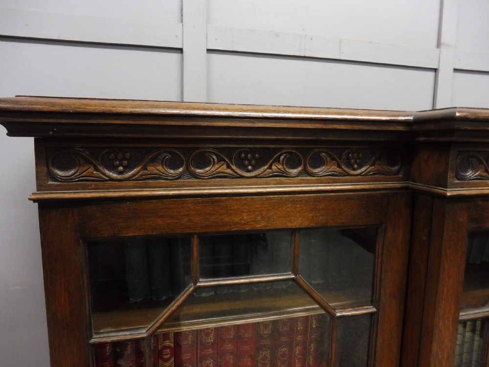 SMALL OAK BREAKFRONT BOOKCASE  View IV