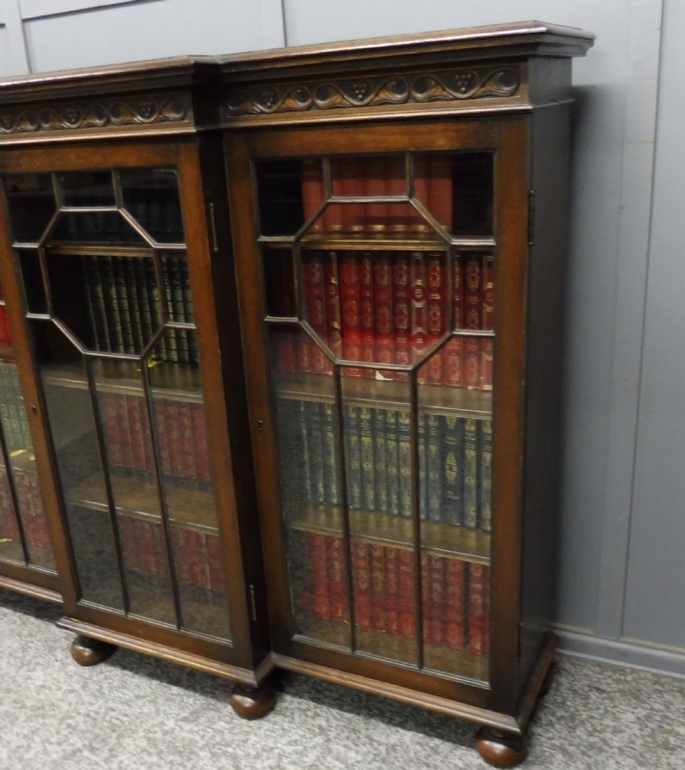 SMALL OAK BREAKFRONT BOOKCASE  View XI