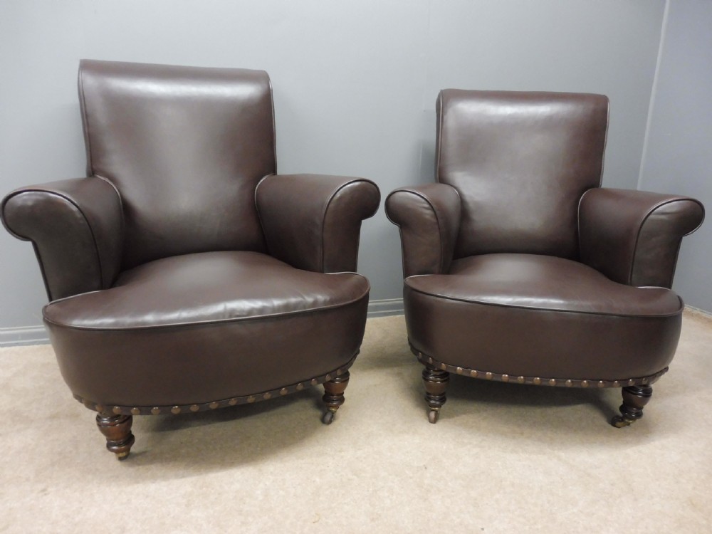 GOOD PAIR OF ANTIQUE LEATHER ARMCHAIRS View II