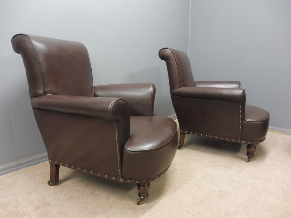 GOOD PAIR OF ANTIQUE LEATHER ARMCHAIRS View III