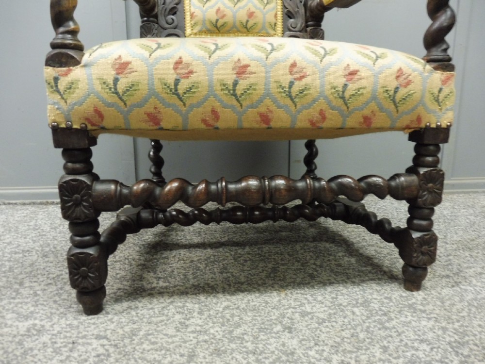 19TH CENTURY CARVED OAK ARMCHAIR View V