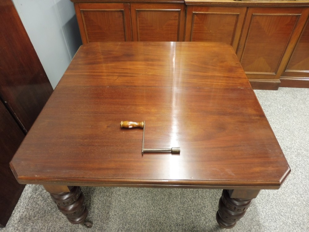 VICTORIAN MAHOGANY EXTENDING DINING TABLE WITH WIND OUT ACTION View IX