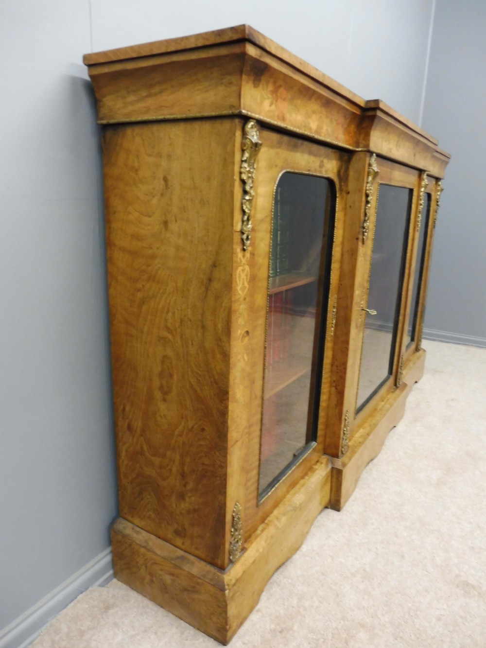 VICTORIAN FIGURED WALNUT BREAKFRONT BOOKCASE View IV