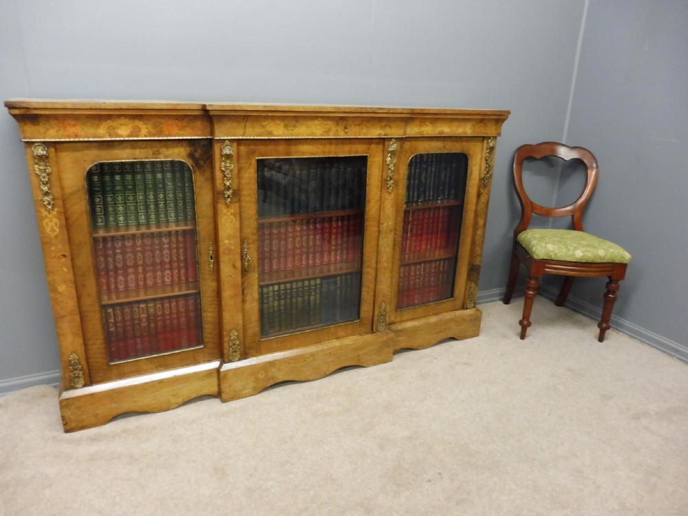 VICTORIAN FIGURED WALNUT BREAKFRONT BOOKCASE View XVI