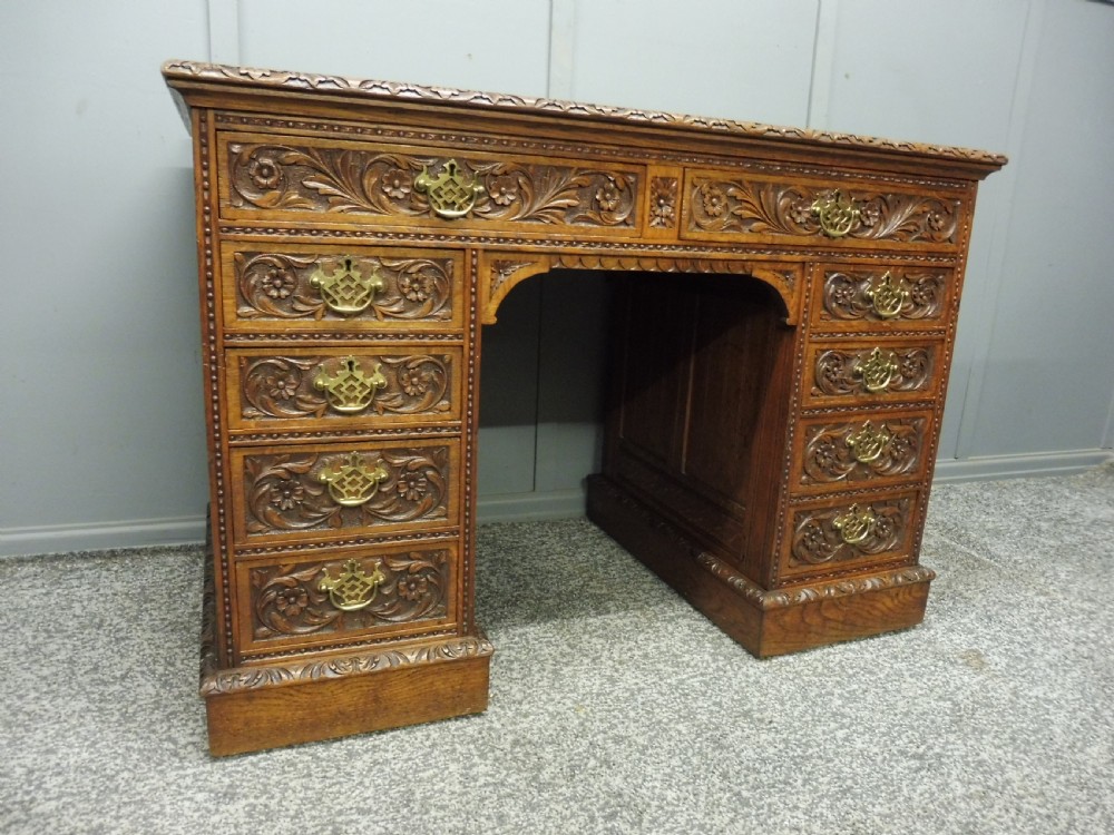 19TH CENTURY CARVED OAK DESK