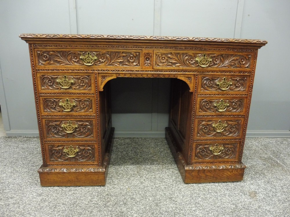 19TH CENTURY CARVED OAK DESK View II