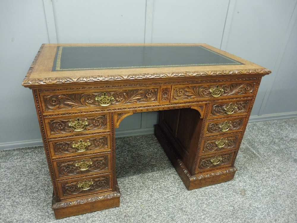 19TH CENTURY CARVED OAK DESK View III