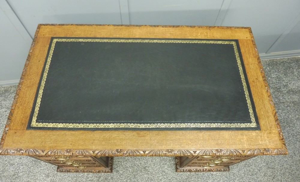19TH CENTURY CARVED OAK DESK View IX