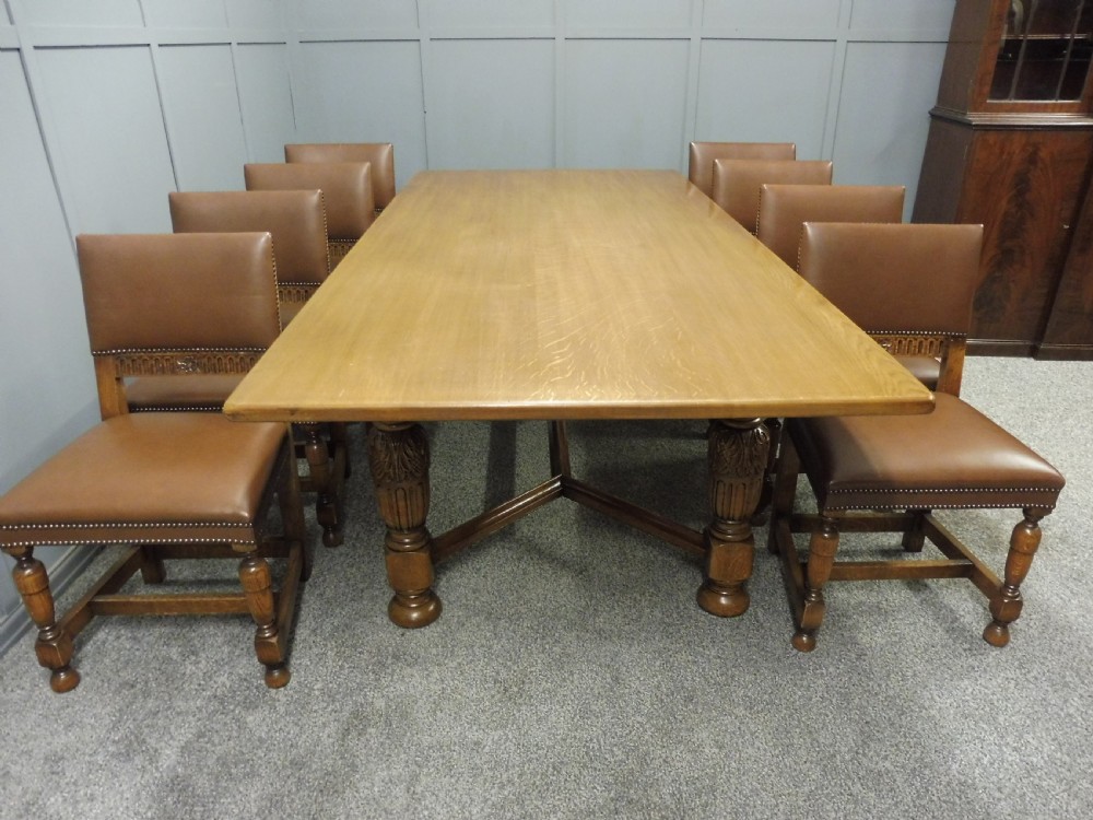 LARGE OAK DINING TABLE AND 8 CHAIRS View II