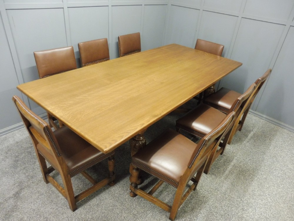 LARGE OAK DINING TABLE AND 8 CHAIRS View V