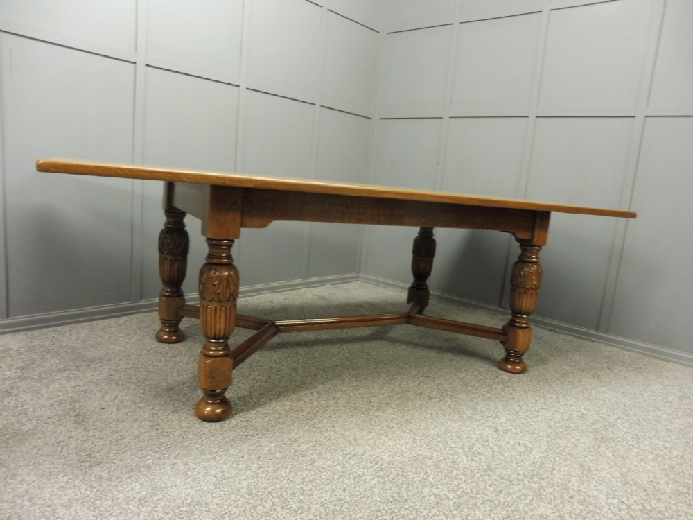 LARGE OAK DINING TABLE AND 8 CHAIRS View VIII