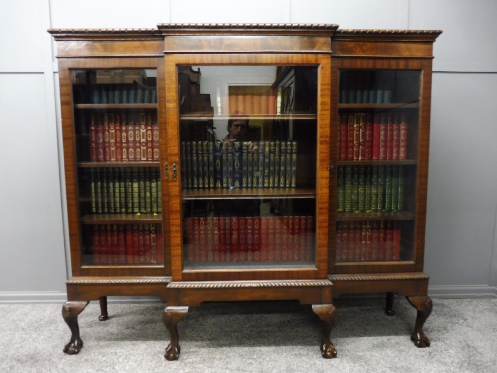 MAHOGANY BREAKFRONT BOOKCASE WITH BALL AND CLAW FEET View II