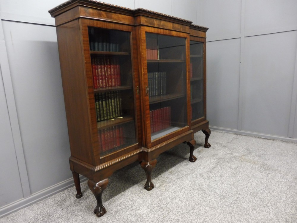 MAHOGANY BREAKFRONT BOOKCASE WITH BALL AND CLAW FEET View III