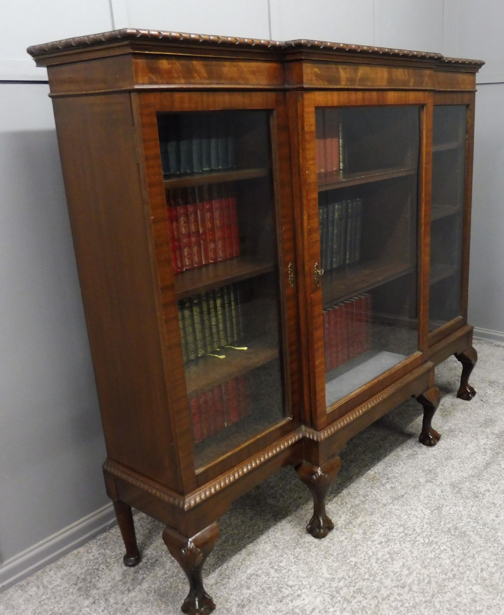 MAHOGANY BREAKFRONT BOOKCASE WITH BALL AND CLAW FEET View IV