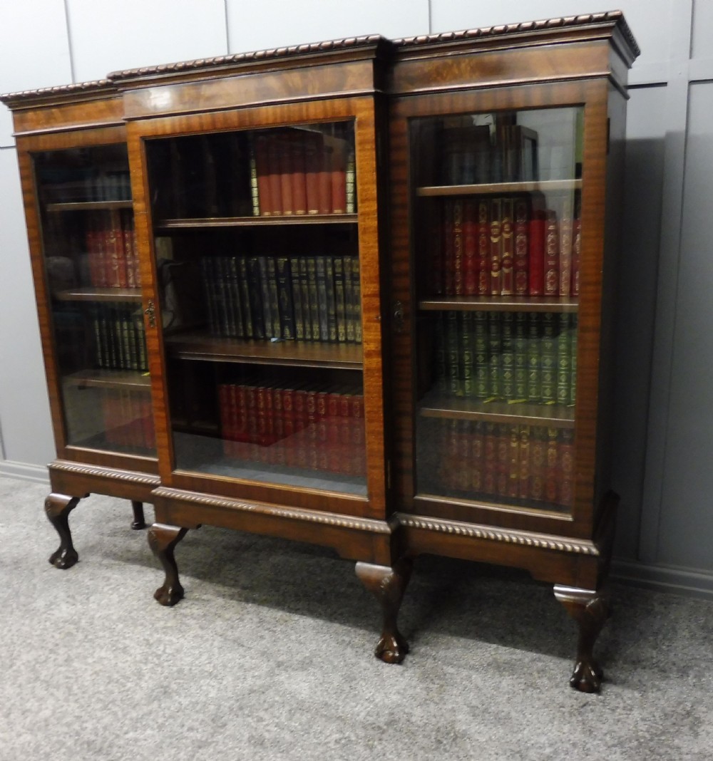 MAHOGANY BREAKFRONT BOOKCASE WITH BALL AND CLAW FEET View VIII