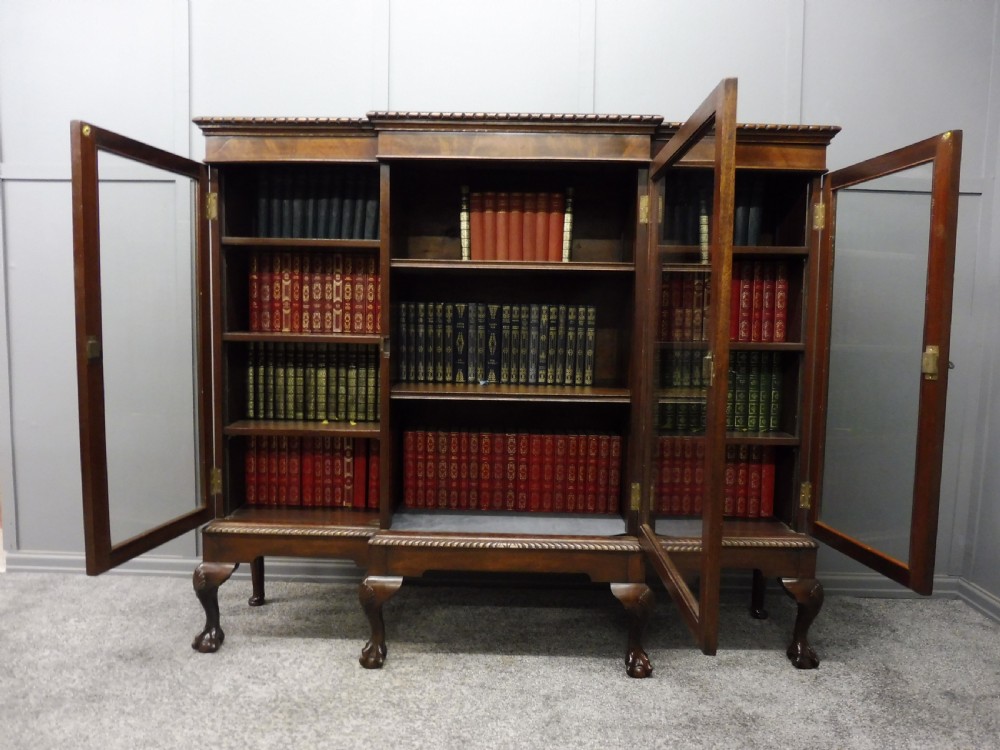 MAHOGANY BREAKFRONT BOOKCASE WITH BALL AND CLAW FEET View X