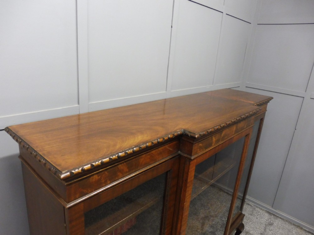 MAHOGANY BREAKFRONT BOOKCASE WITH BALL AND CLAW FEET View XI