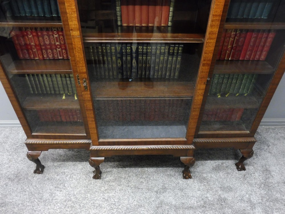 MAHOGANY BREAKFRONT BOOKCASE WITH BALL AND CLAW FEET View XII