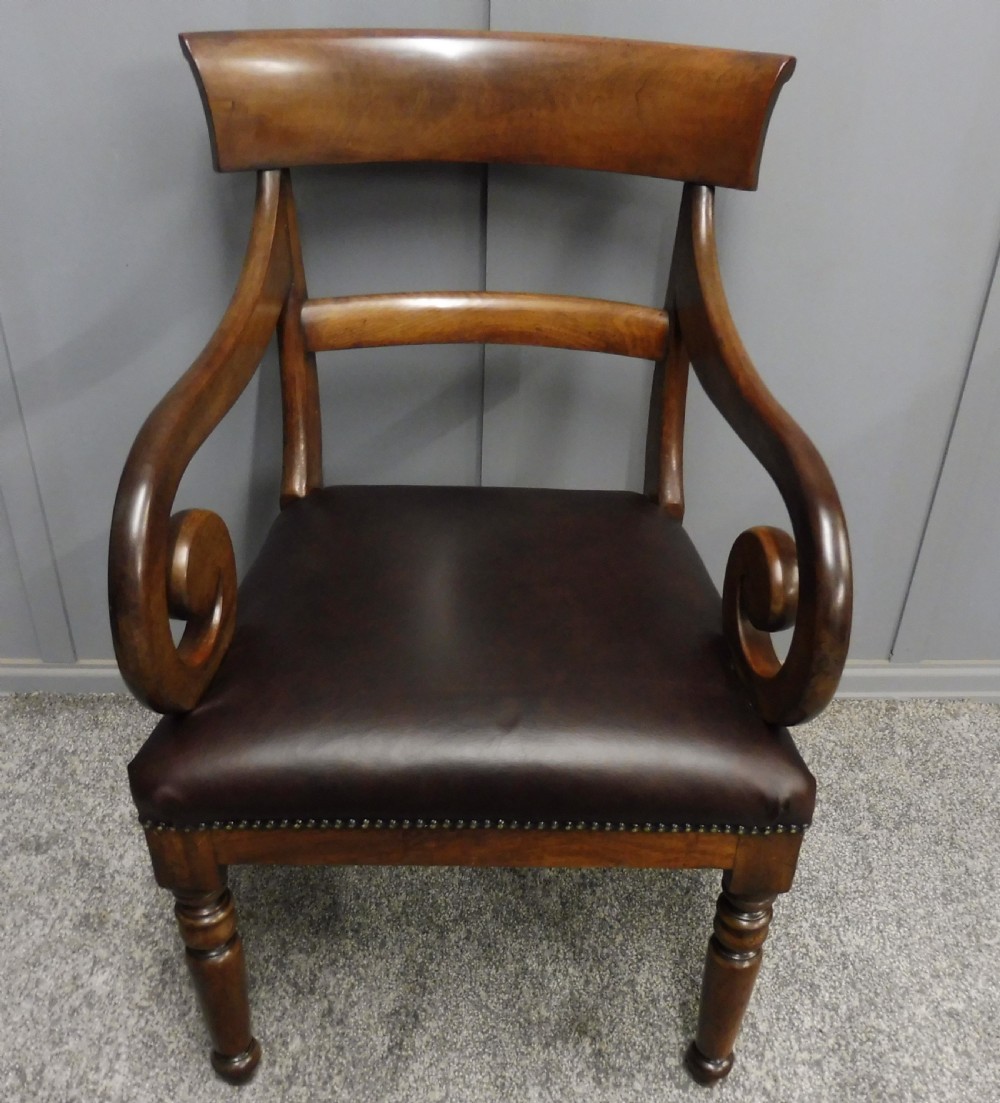 EARLY 19TH CENTURY LEATHER AND MAHOGANY DESK CHAIR