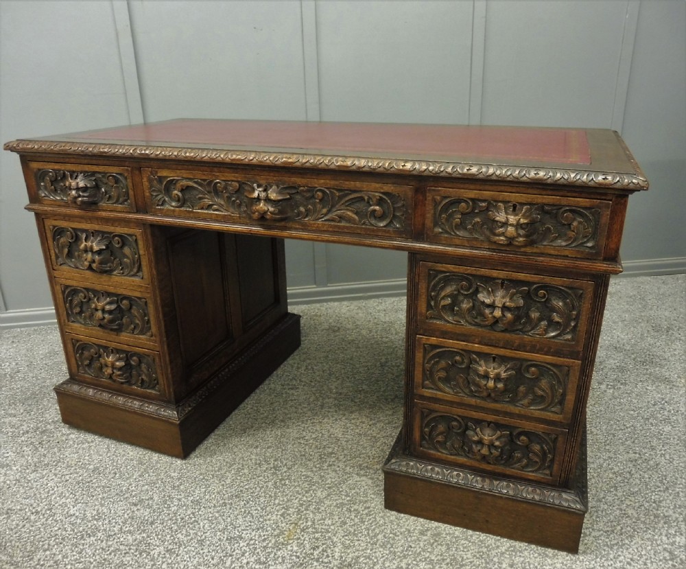 CARVED OAK GREEN MAN DESK BY EDWARDS AND ROBERTS