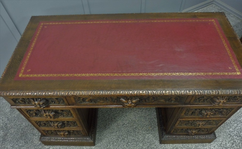 CARVED OAK GREEN MAN DESK BY EDWARDS AND ROBERTS View IX