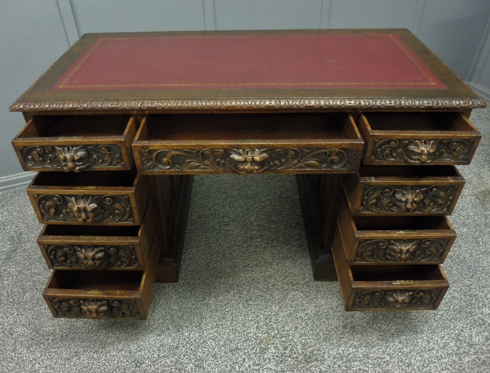 CARVED OAK GREEN MAN DESK BY EDWARDS AND ROBERTS View XI